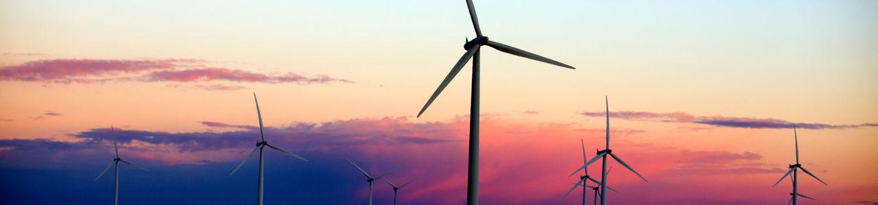 Wind turbines at sunset